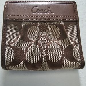 G.U. Women's small coach brown wallet